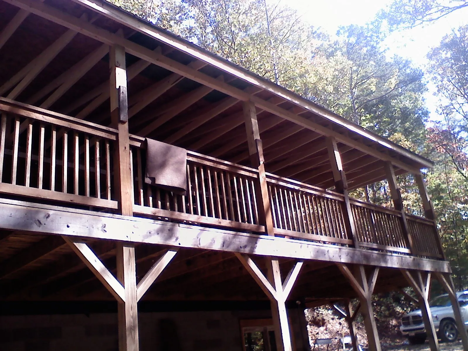 Timber framing under a new elevated porch and deck — Roof Leak Repair in Walthourville by Roofing Brothers